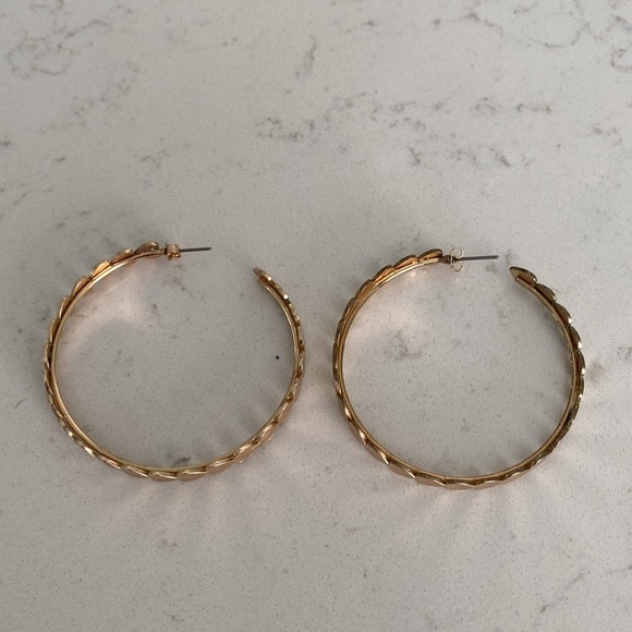Fun heart hoop earrings. Gold color. 2” wide. - Picture 2 of 3